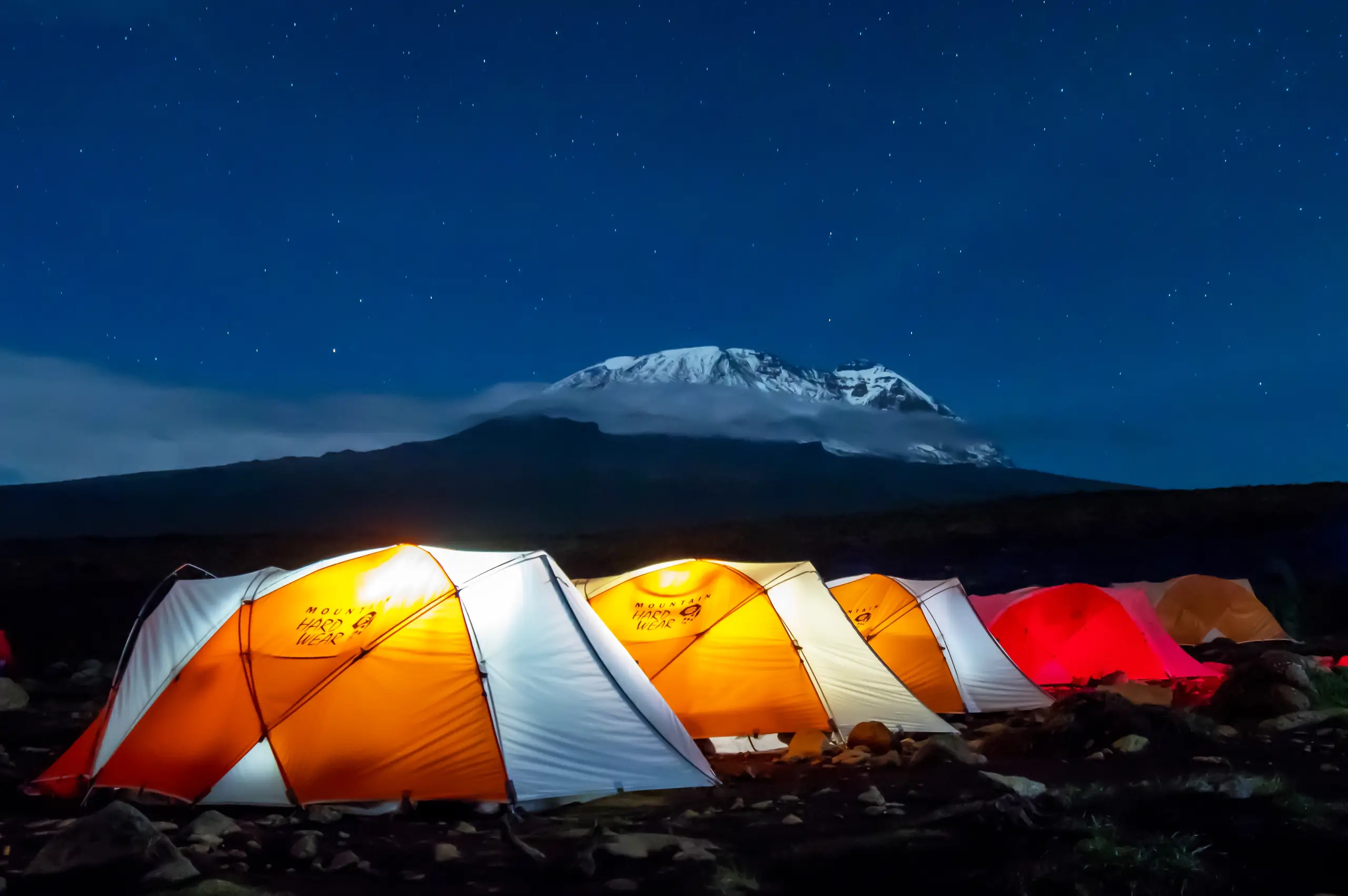 Trekkers hiking Mount Kilimanjaro along the Northern Circuit Route with panoramic mountain views