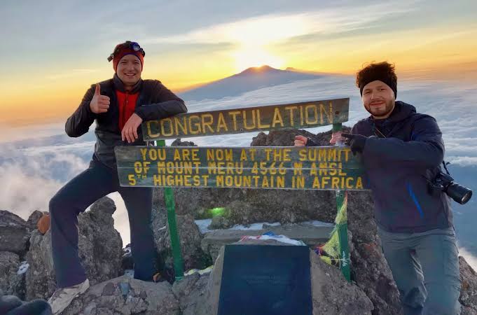 5 Day Mount Meru Into the Clouds trek through forest, alpine landscapes, and high-altitude terrain in Tanzania.
